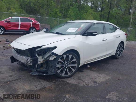2016 Nissan Maxima SV z VIN 1N4AA6AP2GC401273, wystawiony jako IAAI lot #41898456 z przebiegiem 139 720 mil mil oraz . Historia ofert i sprzedaży dostępna na DreamBid. Obrazek 2.