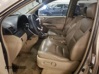 2005 Honda Odyssey EX-L z VIN 5FNRL38625B012216, wystawiony jako Copart lot #51823135 z przebiegiem 206 408 mil mil oraz Szkoda całkowita • Salvage title. Historia ofert i sprzedaży dostępna na DreamBid. Obrazek 7.