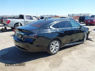 2017 Chevrolet Impala LT with VIN 1G1105S39HU189768, listed as a IAAI auction lot 41762234 with 165,927 mi miles and . Bid and sale history available at DreamBid. Image 4.