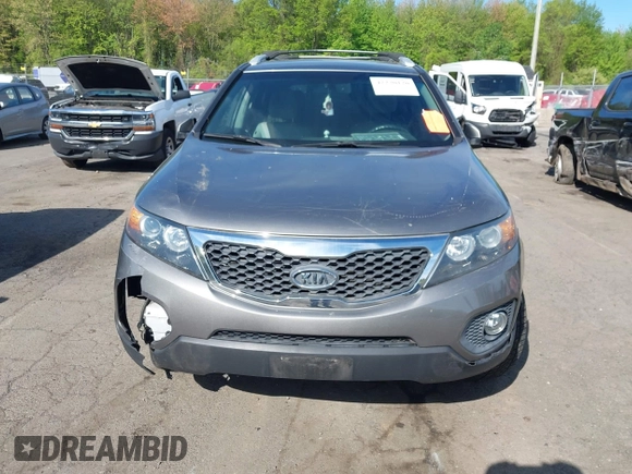 2012 Kia Sorento LX with VIN 5XYKT3A65CG266682, listed as a IAAI auction lot 42220120 with 118,153 mi miles and . Bid and sale history available at carsss.com. Image 6.