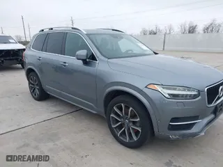 2016 Volvo XC90 T6 Momentum with VIN YV4A22PKXG1021392, listed as a IAAI auction lot 41413673 with 144,761 mi miles. Bid and sale history available at carsss.com. Image 1.