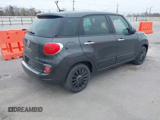2014 FIAT 500L Easy with VIN ZFBCFABH1EZ011485, listed as a IAAI auction lot 41598470 with 69,036 mi miles and . Bid and sale history available at DreamBid. Image 4.