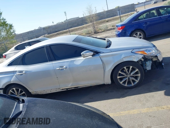 2015 Hyundai Azera z VIN KMHFG4JG0FA453994, wystawiony jako IAAI lot #42002922 z przebiegiem 102 094 mil mil oraz . Historia ofert i sprzedaży dostępna na DreamBid. Obrazek 13.