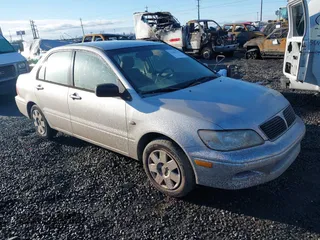 2003 Mitsubishi Lancer ES with VIN JA3AJ26E63U092730, listed as a IAAI auction lot 41506294 with 188,007 mi miles. Bid and sale history available at carsss.com. Image 1.