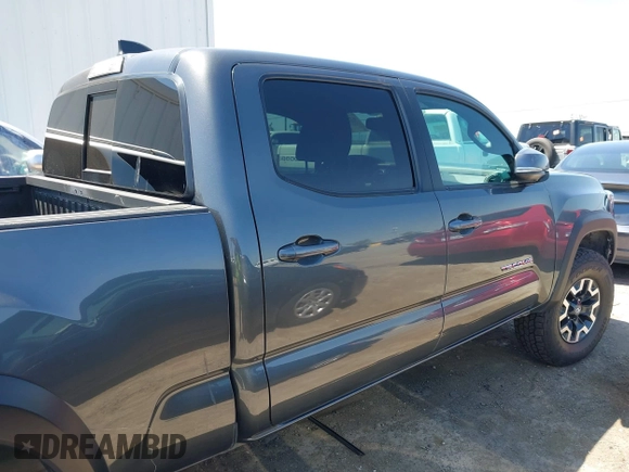2023 Toyota Tacoma SR5 z VIN 3TMDZ5BN6PM153633, wystawiony jako IAAI lot #42353187 z przebiegiem 50 020 mil mil oraz . Historia ofert i sprzedaży dostępna na DreamBid. Obrazek 14.