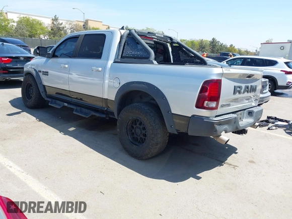 2016 Ram 1500 Rebel z VIN 1C6RR7YT5GS251994, wystawiony jako IAAI lot #42139378 z przebiegiem 102 736 mil mil oraz . Historia ofert i sprzedaży dostępna na DreamBid. Obrazek 3.
