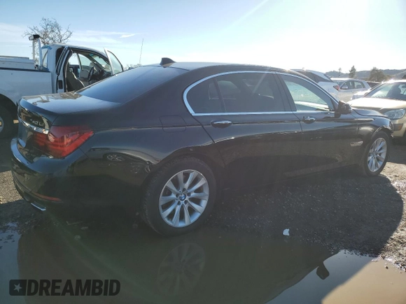 2015 BMW 7 Series 740Li with VIN WBAYE4C55FD947214, listed as a Copart auction lot 87261354 with 393,256 mi miles and Salvage Title. Bid and sale history available at DreamBid. Image 3.