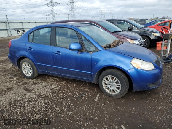 2012 Suzuki SX4 LE with VIN JS2YC5A35C6303573, listed as a Copart auction lot 84844564 with 0 mi miles and Clean Title. Bid and sale history available at carsss.com. Image 4.
