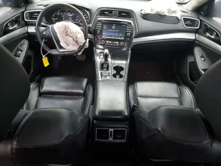 2017 Nissan Maxima Platinum with VIN 1N4AA6AP7HC384827, listed as a Copart auction lot 57254815 with 136,572 mi miles and Salvage title. Bid and sale history available at DreamBid. Image 8.