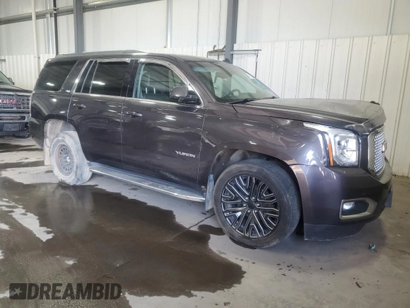 2015 GMC Yukon SLT with VIN 1GKS2BKC7FR279302, listed as a Copart auction lot 47827085 with 176,076 mi miles and Salvage Title. Bid and sale history available at carsss.com. Image 4.