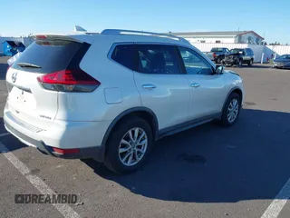 2018 Nissan Rogue SV with VIN KNMAT2MV8JP561410, listed as a IAAI auction lot 41691135 with 76,922 mi miles. Bid and sale history available at carsss.com. Image 4.