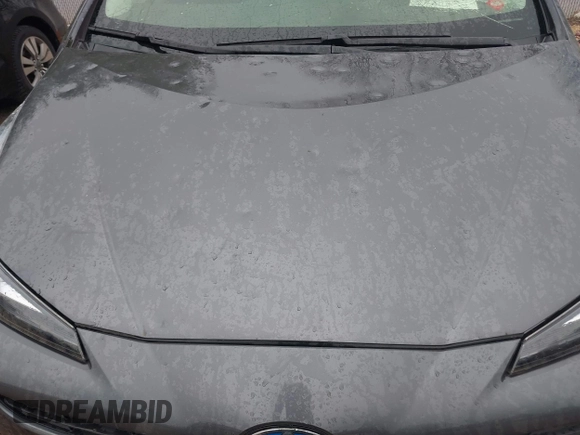 2021 Toyota Prius L Eco with VIN JTDKAMFU6M3140081, listed as a IAAI auction lot 42131187 with 103,973 mi miles and . Bid and sale history available at DreamBid. Image 6.