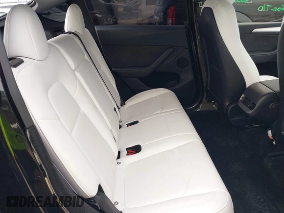 2024 Tesla Model Y Performance z VIN 7SAYGDEF7RA267752, wystawiony jako IAAI lot #42126456 z przebiegiem 21 216 mil mil oraz . Historia ofert i sprzedaży dostępna na DreamBid. Obrazek 8.