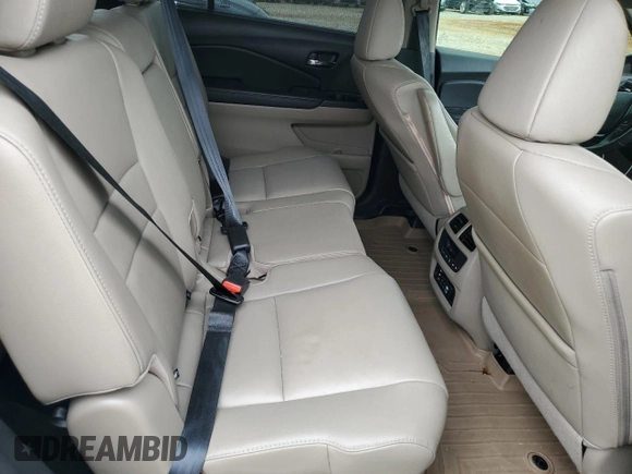 2017 Honda Pilot Touring z VIN 5FNYF6H92HB067140, wystawiony jako Copart lot #55757925 z przebiegiem 132 425 mil mil oraz Szkoda całkowita • Salvage title. Historia ofert i sprzedaży dostępna na DreamBid. Obrazek 11.