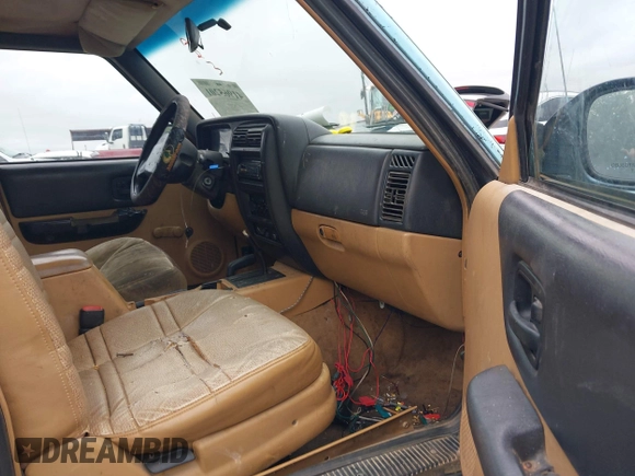 1997 Jeep Cherokee SE z VIN 1J4FJ28S3VL573144, wystawiony jako IAAI lot #41965201 z przebiegiem 298 276 mil mil oraz . Historia ofert i sprzedaży dostępna na DreamBid. Obrazek 5.