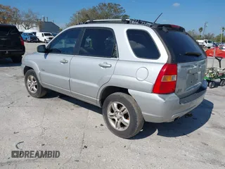 2005 Kia Sportage LX with VIN KNDJE723957128130, listed as a IAAI auction lot 41646193 with 188,142 mi miles and . Bid and sale history available at carsss.com. Image 3.