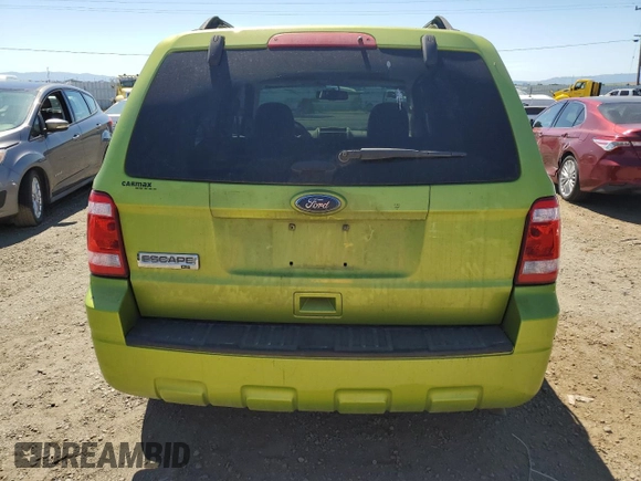 2012 Ford Escape XLT z VIN 1FMCU0D74CKA12634, wystawiony jako Copart lot #56332815 z przebiegiem 149 390 mil mil oraz Szkoda całkowita • Salvage title. Historia ofert i sprzedaży dostępna na DreamBid. Obrazek 6.