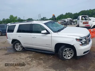 2019 Chevrolet Tahoe LT with VIN 1GNSKBKC3KR144850, listed as a IAAI auction lot 42420199 with Not provided miles and . Bid and sale history available at DreamBid. Image 13.