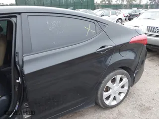 2012 Hyundai Elantra GLS with VIN KMHDH4AE4CU217877, listed as a IAAI auction lot 41927929 with 999,999 mi miles. Bid and sale history available at carsss.com. Image 6.