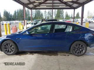2022 Tesla Model 3 Long Range with VIN 5YJ3E1EB3NF267365, listed as a IAAI auction lot 41996594 with 32,687 mi miles and . Bid and sale history available at DreamBid. Image 15.