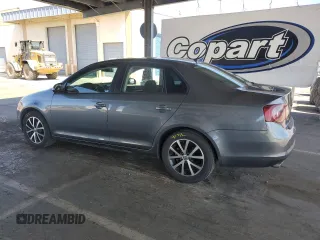 2010 Volkswagen Jetta S with VIN 3VWJZ7AJ9AM052569, listed as a Copart auction lot 59016965 with 166,950 mi miles and Salvage title. Bid and sale history available at DreamBid. Image 2.