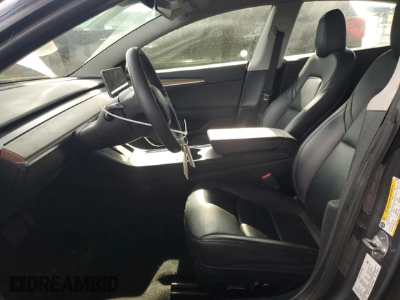 2023 Tesla Model 3 with VIN 5YJ3E1EA0PF449499, listed as a Copart auction lot 52900515 with 42,706 mi miles and Non Repairable. Bid and sale history available at DreamBid. Image 7.