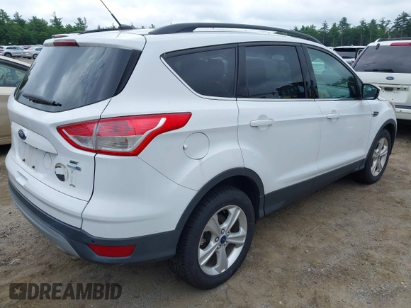 2014 Ford Escape SE with VIN 1FMCU9GX4EUE32062, listed as a IAAI auction lot 42710911 with 68,201 mi miles and . Bid and sale history available at DreamBid. Image 4.