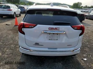 2018 GMC Terrain Denali z VIN 3GKALXEX6JL282177, wystawiony jako Copart lot #60622865 z przebiegiem 78 034 mil mil oraz Czysty tytuł • Clean title. Historia ofert i sprzedaży dostępna na DreamBid. Obrazek 6.