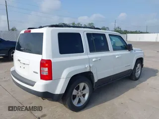 2014 Jeep Patriot Latitude with VIN 1C4NJPFA3ED618523, listed as a IAAI auction lot 41750625 with Not Provided miles and . Bid and sale history available at carsss.com. Image 4.