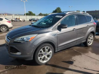 2013 Ford Escape Titanium with VIN 1FMCU0J93DUA78278, listed as a Copart auction lot 63519845 with 141,874 mi miles and Salvage title. Bid and sale history available at DreamBid. Image 1.
