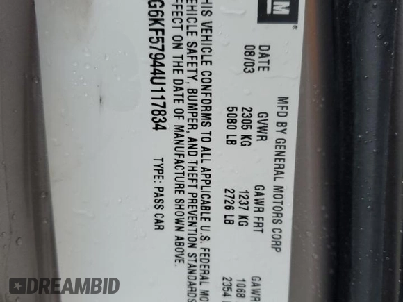 2004 Cadillac DeVille DTS z VIN 1G6KF57944U117834, wystawiony jako Copart lot #89320975 z przebiegiem 149 820 mil mil oraz Szkody całkowita. Historia ofert i sprzedaży dostępna na DreamBid. Obrazek 12.