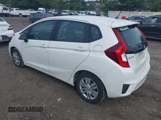 2015 Honda Fit LX with VIN 3HGGK5H51FM752870, listed as a IAAI auction lot 42378020 with 109,698 mi miles and . Bid and sale history available at DreamBid. Image 3.