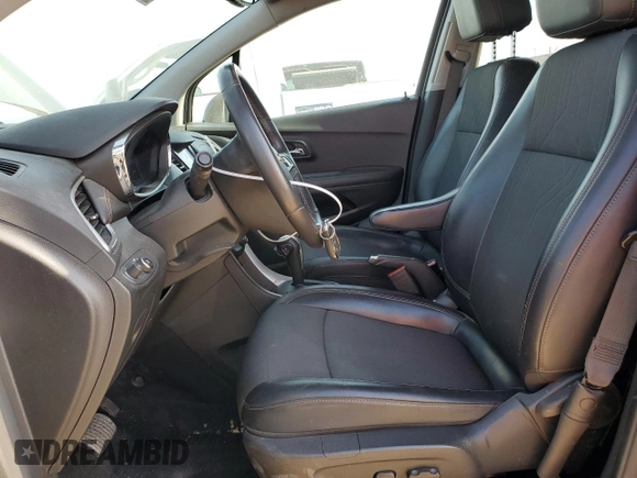 2020 Chevrolet Trax LT z VIN KL7CJLSBXLB352647, wystawiony jako Copart lot #52739415 z przebiegiem 76 368 mil mil oraz Czysty tytuł • Clean title. Historia ofert i sprzedaży dostępna na DreamBid. Obrazek 7.
