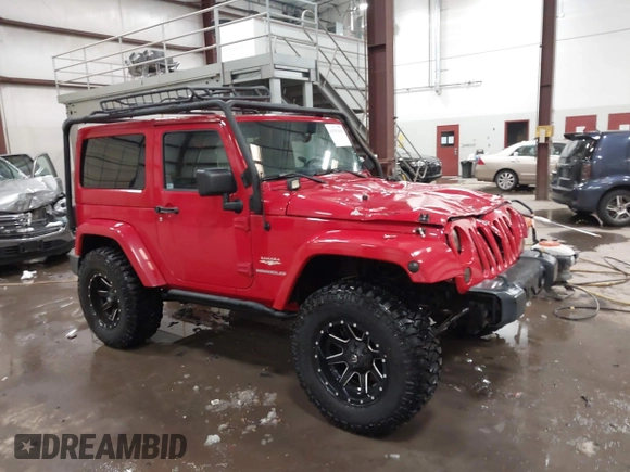 2011 Jeep Wrangler Sahara with VIN 1J4AA5D10BL593534, listed as a IAAI auction lot 41551416 with 101,716 mi miles and . Bid and sale history available at DreamBid. Image 1.