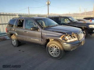 2003 Jeep Grand Cherokee Limited with VIN 1J4GW58N03C561385, listed as a Copart auction lot 75777094 with 169,705 mi miles and Salvage Title. Bid and sale history available at carsss.com. Image 4.