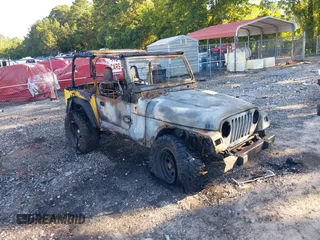 2002 Jeep Wrangler SE with VIN 1J4FA29PX2P716508, listed as a IAAI auction lot 42514651 with Not provided miles and . Bid and sale history available at DreamBid. Image 1.