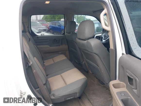 2006 Honda Ridgeline RTS z VIN 2HJYK16486H543139, wystawiony jako IAAI lot #42184129 z przebiegiem 260 840 mil mil oraz . Historia ofert i sprzedaży dostępna na DreamBid. Obrazek 8.
