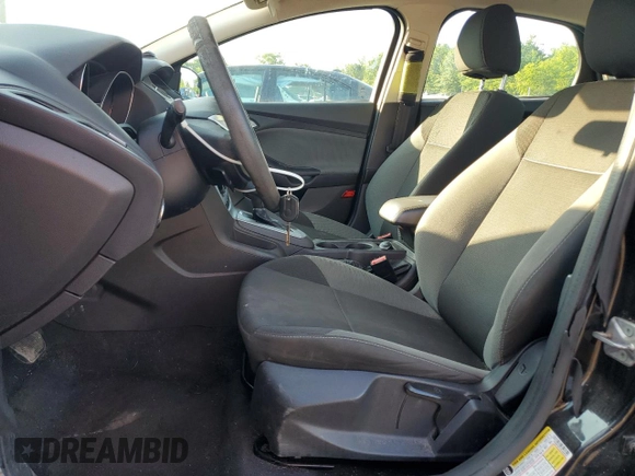 2013 Ford Focus SE z VIN 1FADP3F27DL369634, wystawiony jako Copart lot #61409725 z przebiegiem 122 709 mil mil oraz Szkoda całkowita • Salvage title. Historia ofert i sprzedaży dostępna na DreamBid. Obrazek 7.