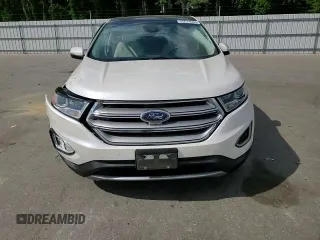 2015 Ford Edge Titanium z VIN 2FMPK4K99FBB84806, wystawiony jako Copart lot #55674085 z przebiegiem 58 442 mil mil oraz Szkoda całkowita • Salvage title. Historia ofert i sprzedaży dostępna na DreamBid. Obrazek 14.
