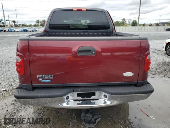 2003 Ford F-150 XLT with VIN 1FTRW07673KA75061, listed as a Copart auction lot 52034595 with Not Provided miles and Salvage Title. Bid and sale history available at carsss.com. Image 6.