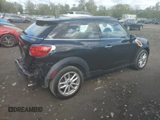 2015 MINI Paceman z VIN WMWSS1C57FWN95173, wystawiony jako Copart lot #73308804 z przebiegiem 117 821 mil mil oraz Szkoda całkowita • Salvage title. Historia ofert i sprzedaży dostępna na DreamBid. Obrazek 3.