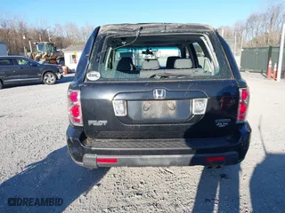 2007 Honda Pilot LX with VIN 5FNYF18177B017068, listed as a IAAI auction lot 41844268 with 164,145 mi miles. Bid and sale history available at carsss.com. Image 16.