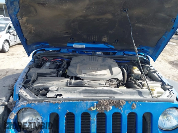 2015 Jeep Wrangler Unlimited Rubicon with VIN 1C4BJWFG5FL558348, listed as a IAAI auction lot 41460025 with 106,012 mi miles. Bid and sale history available at carsss.com. Image 10.