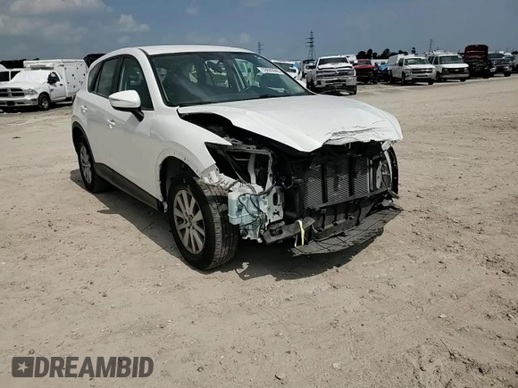 2016 Mazda CX-5 Sport with VIN JM3KE4BY0G0742436, listed as a Copart auction lot 59693945 with 74,314 mi miles and Salvage title. Bid and sale history available at DreamBid. Image 15.