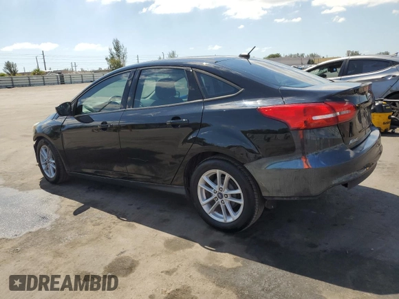 2017 Ford Focus SE with VIN 1FADP3F26HL221366, listed as a Copart auction lot 53295835 with 100,398 mi miles and Salvage Title. Bid and sale history available at carsss.com. Image 2.
