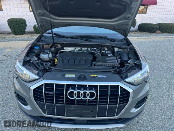 2021 Audi Q3 Premium z VIN WA1AUCF3XM1102363, wystawiony jako Copart lot #58672195 z przebiegiem 208 956 mil mil oraz Czysty tytuł • Clean title. Historia ofert i sprzedaży dostępna na DreamBid. Obrazek 7.