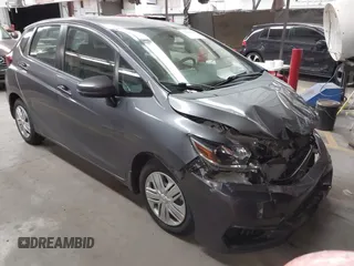 2019 Honda Fit LX z VIN 3HGGK5H45KM735412, wystawiony jako IAAI lot #42432318 z przebiegiem Nie podano mil oraz . Historia ofert i sprzedaży dostępna na DreamBid. Obrazek 1.