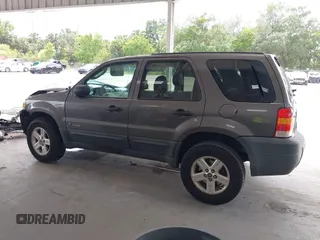 2005 Ford Escape Hybrid with VIN 1FMCU95HX5KD54412, listed as a IAAI auction lot 42115468 with 151,922 mi miles and . Bid and sale history available at DreamBid. Image 14.