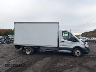 2018 Ford Transit with VIN 1FDBF8ZM7JKA80667, listed as a IAAI auction lot 37840295 with 74,566 mi miles and . Bid and sale history available at DreamBid. Image 13.