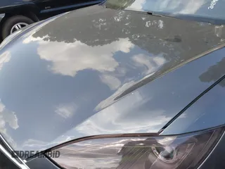 2014 Tesla Model S P85D with VIN 5YJSA1H29EFP63032, listed as a IAAI auction lot 42132145 with Not Provided miles and . Bid and sale history available at DreamBid. Image 10.